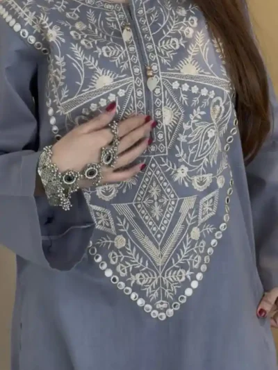 Woman wearing grey embroidered cotton kurti with intricate front design, stylish ethnic outfit - Elegant Grey Cotton Kurti with Heavy Embroidery – New Launch Collection