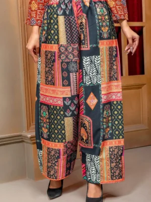 Rust orange Bandhani print viscose rayon co - ord set tunic paired with contrasting multi-print patchwork pants for women - Rust Orange Bandhani Tunic & Dhoti Pant Co-Ord Set