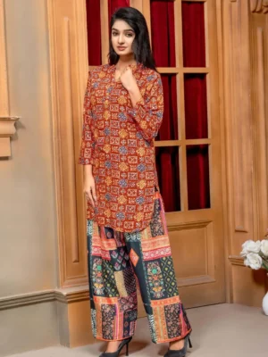 Rust orange Bandhani print viscose rayon co - ord set tunic paired with contrasting multi-print patchwork pants for women - Rust Orange Bandhani Tunic & Dhoti Pant Co-Ord Set